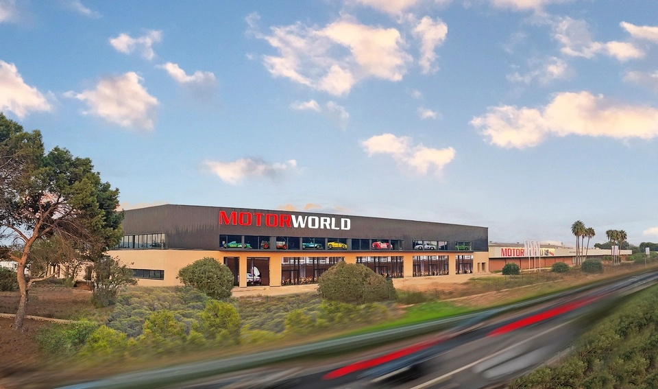 A large, modern building labeled 